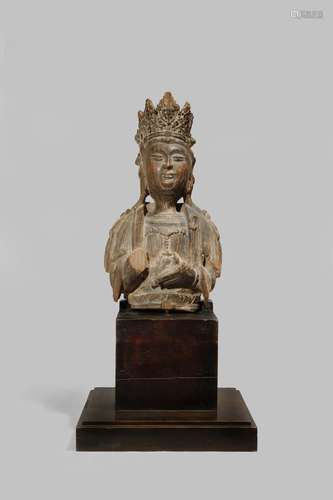 A CHINESE CARVED WOOD BUST OF GUANYIN