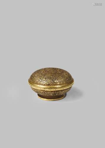A CHINESE GILT-BRONZE CIRCULAR BOX AND COVER