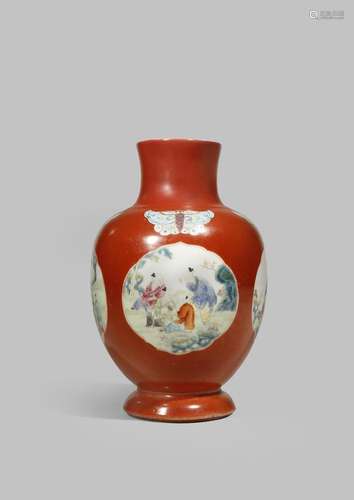 A CHINESE CORAL GROUND 'BOYS' VASE