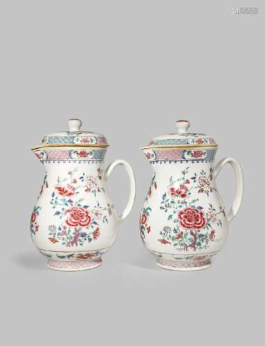 A PAIR OF LARGE CHINESE FAMILLE ROSE JUGS AND COVERS