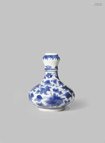 A SMALL CHINESE BLUE AND WHITE BOTTLE VASE