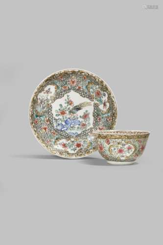 A CHINESE FAMILLE ROSE TEA BOWL AND SAUCER