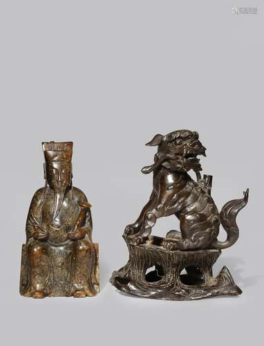 A CHINESE BRONZE LION DOG INCENSE STICK HOLDER