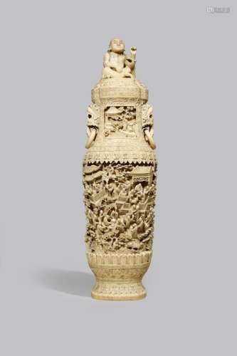 A LARGE CHINESE CANTON IVORY VASE AND COVER