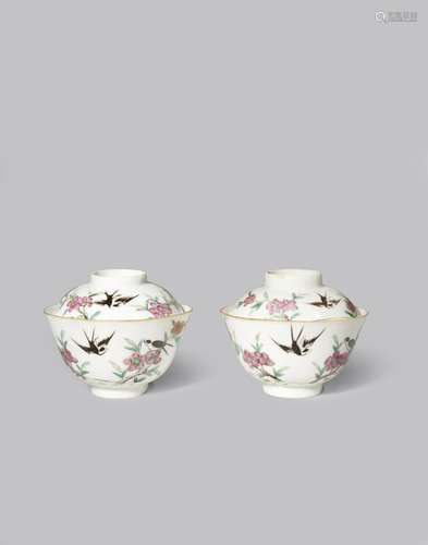 A PAIR OF CHINESE FAMILLE ROSE 'FLOWERS AND SWALLOWS' BOWLS AND COVERS