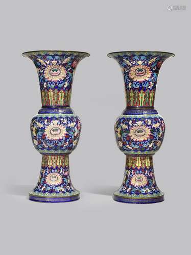 A PAIR OF CHINESE FAMILLE ROSE CANTON ENAMEL VASES