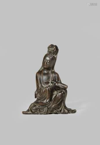 A SMALL CHINESE BRONZE FIGURE OF GUANYIN