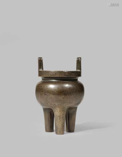 A SMALL CHINESE ARCHAISTIC 'SHI SOU' SILVER INLAID BRONZE INCENSE BURNER