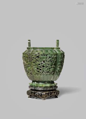 A CHINESE SPINACH-GREEN JADE RETICULATED VASE