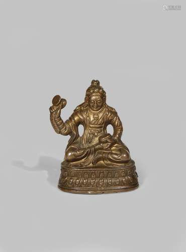 A TIBETAN GILT COPPER ALLOY FIGURE OF PADMASAMBHAVA AS PADMA GYALPO