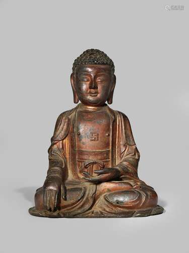 A CHINESE GILT AND LACQUERED BRONZE FIGURE OF BUDDHA SAKYAMUNI