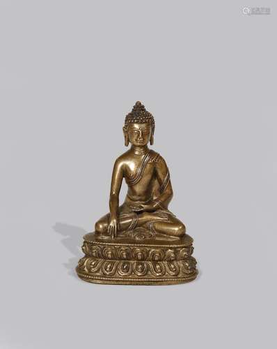 A TIBETAN COPPER INLAID BRONZE FIGURE OF BUDDHA SAKYAMUNI