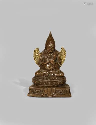 A TIBETAN PARCEL-GILT FIGURE OF TSONGKAPA