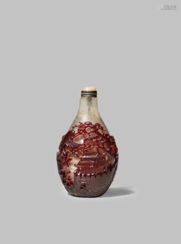 A FINE CHINESE RED-OVERLAY GLASS 'PAVILION' SNUFF BOTTLE