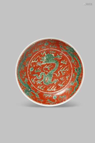 A RARE CHINESE IRON RED-GROUND 'DRAGON' DISH