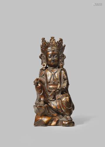 A CHINESE GILT AND LACQUERED BRONZE FIGURE OF GUANYIN