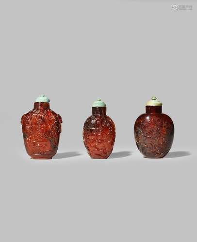 THREE CHINESE AMBER SNUFF BOTTLES