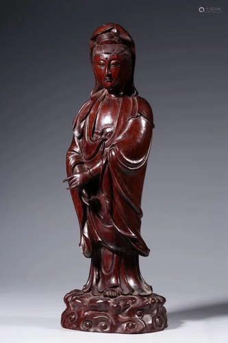 A WOOD GUANYIN SCULPTURE