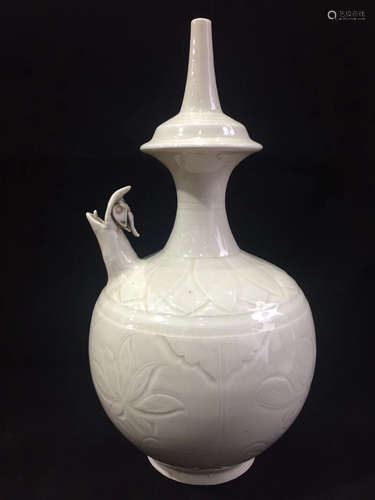 A WHITE GLAZED EWER