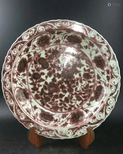 A UNDERGLAZED RED FLORAL-RIM CHARGER