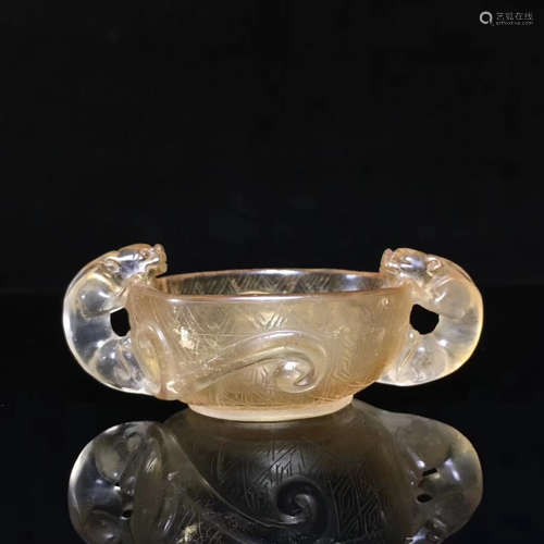 A CRYSTAL CARVED DOUBLE HANDLES CUP