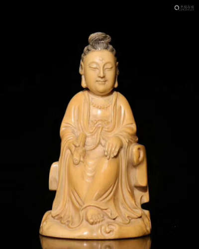 A XY CARVED GUANYIN FIGURE