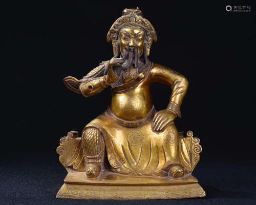 A GILT BRONZE CARVED GUANGONG FIGURE