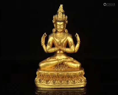 A GILT BRONZE CARVED BUDDHA FIGURE