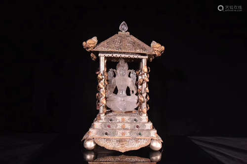 A SILVER TEMPLE AND CRYSTAL CARVED BUDDHA FIGURE