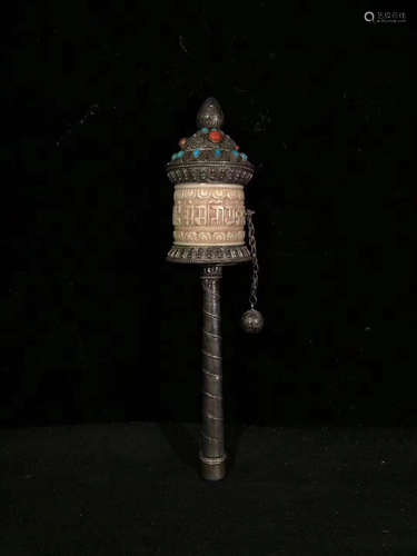 A SILVER CARVED TIBET PRAYER WHEEL