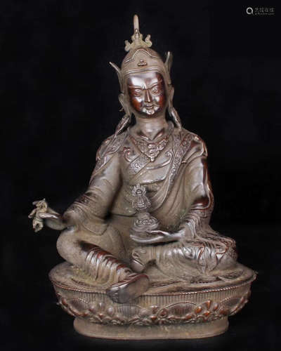 A MING BRONZE CARVED BUDDHA FIGURE