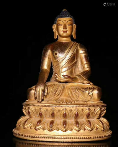 A GILT BRONZE BUDDHA FIGURE