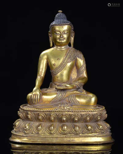 GILT BRONZE CARVED FIGURE OF SHAKYAMUNI