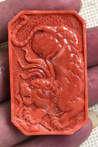 A MOMO CORAL CARVED TIGER PATTERN TABLET