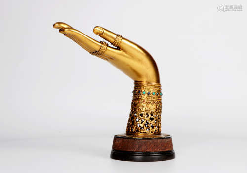 A chinese gold gilt bronze buddha hand