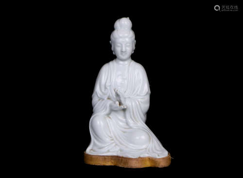 A chinese white glaze guanyin statue