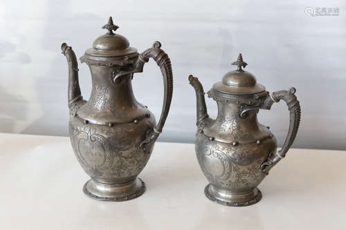 A pair of chinese tin tea pot