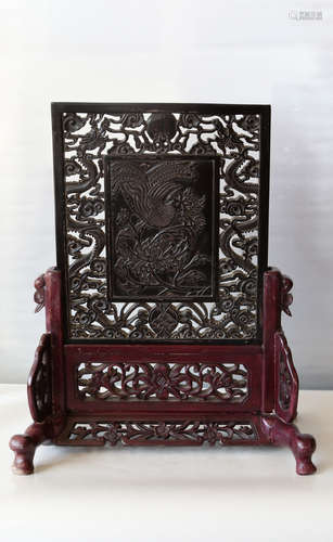 A chinese amber carved screen