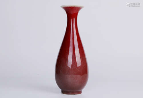 A chinese red porcelain bottle