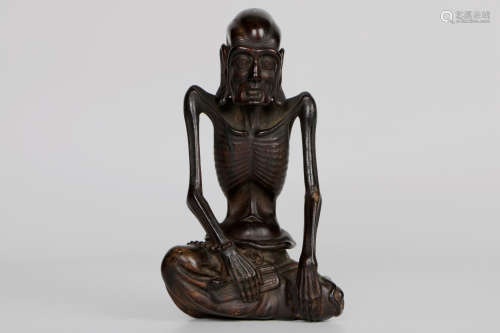 A chinese zitan carved statue