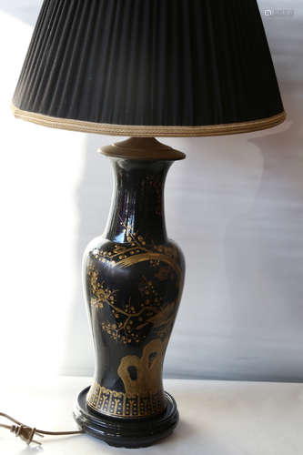 A chinese blace glaze lamp