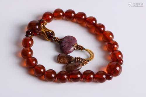 A chinese 18 amber beads