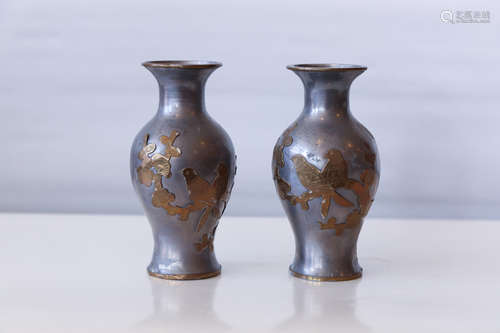 A pair of chinese tin vase