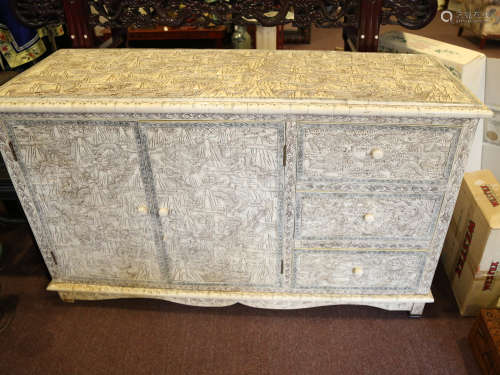 A chinese bone carved cabinet