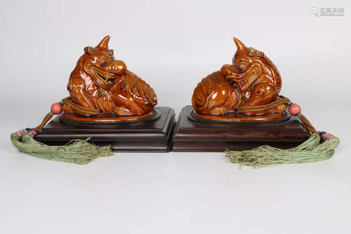 A pair of chinese porcelain paperweights