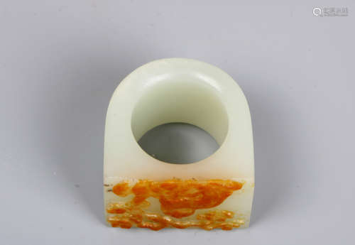 A chinese white jade carved thumb ring