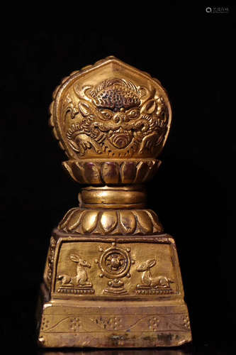 A TIBETAN BRONZE GILT ROUND SEAL, QING DYNASTY