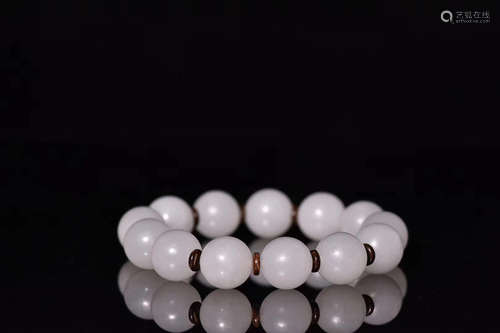 AN OLD TIBETAN HETIAN SUTE WHITE JADE BRACELET