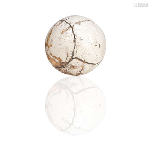 A FEATHER FILLED GOLF BALL CIRCA 1850