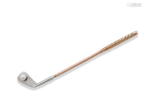 A golf club brooch